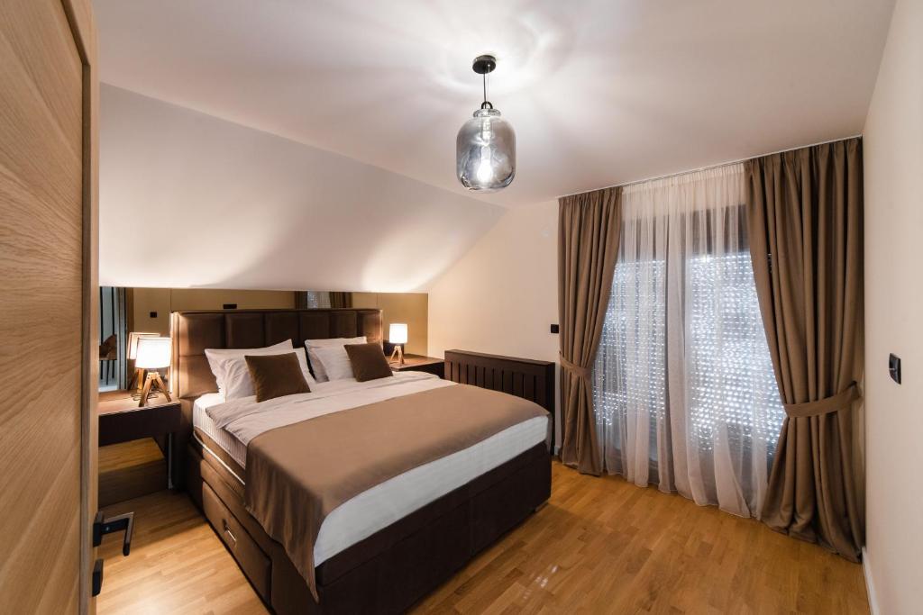 Postel nebo postele na pokoji v ubytování Villa Inverno & Spa