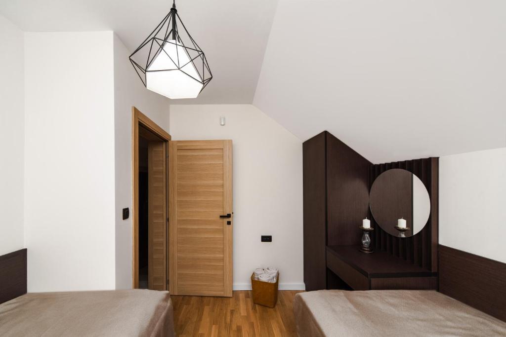 Postel nebo postele na pokoji v ubytování Villa Inverno & Spa