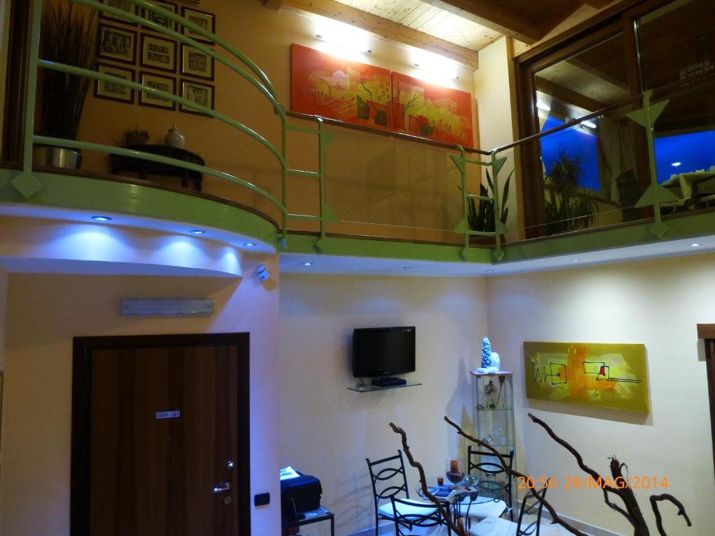TV a/nebo společenská místnost v ubytování B&B Domus Traiani Benevento