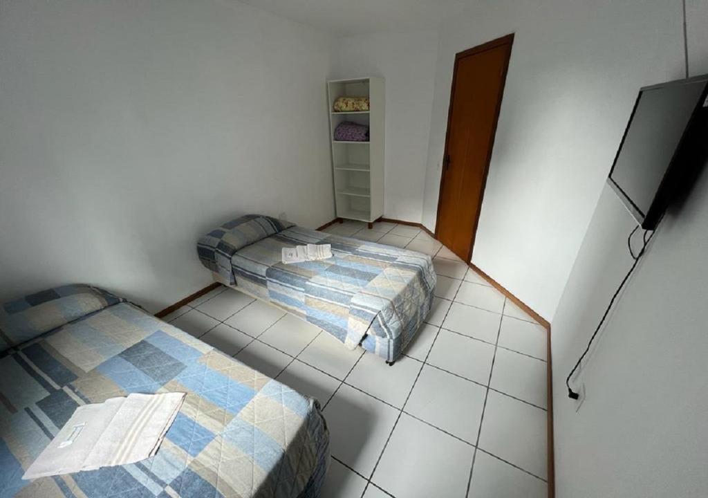 Postel nebo postele na pokoji v ubytování Pousada Louise