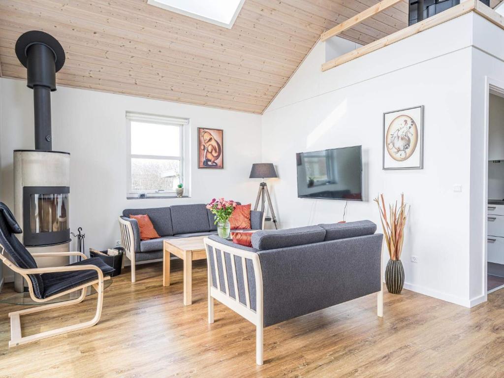 TV a/nebo společenská místnost v ubytování Holiday home Tarm LIX
