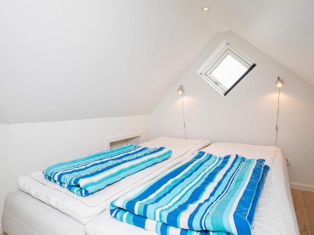 Postel nebo postele na pokoji v ubytování 4 person holiday home in Skagen
