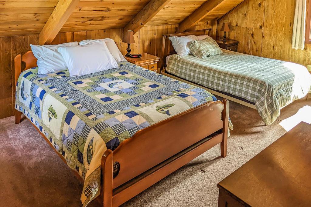 Postel nebo postele na pokoji v ubytování Yakima River Cabin