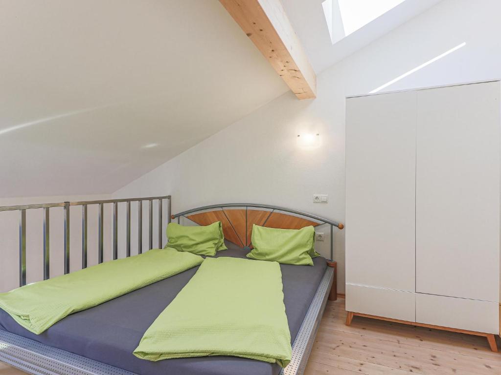 A bed or beds in a room at Haus Rabl Dan