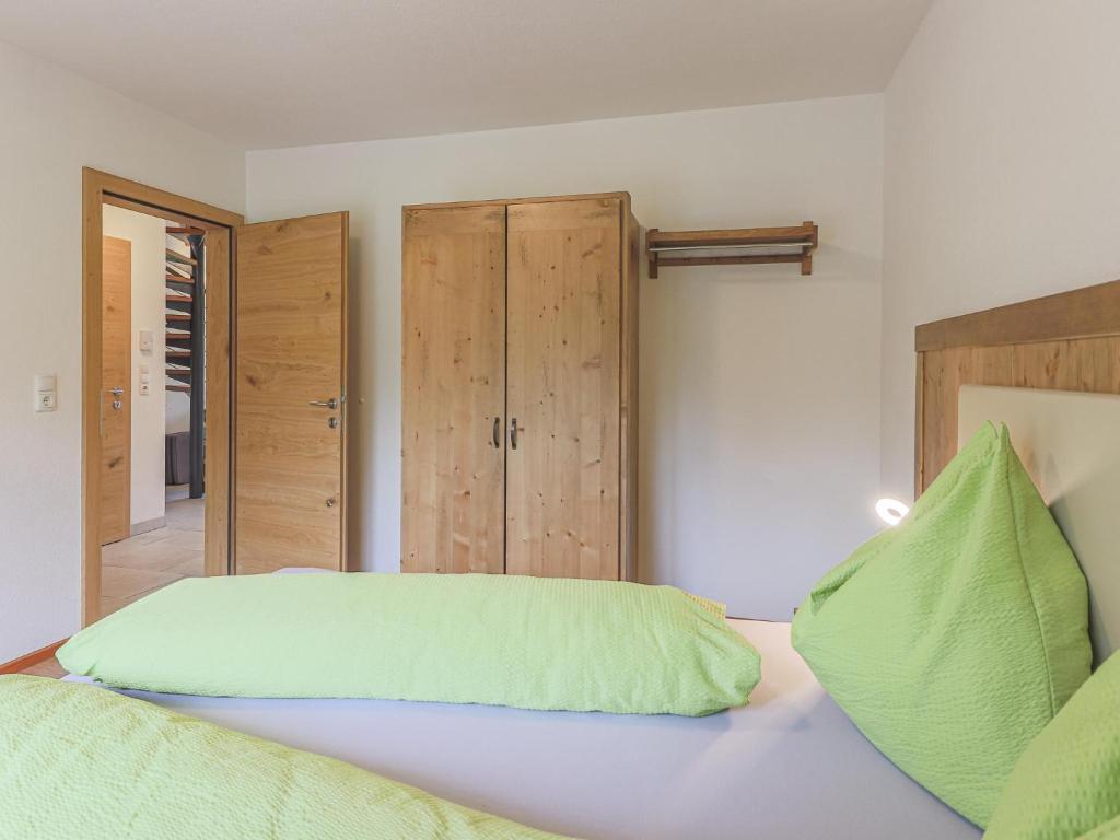 A bed or beds in a room at Haus Rabl Deng