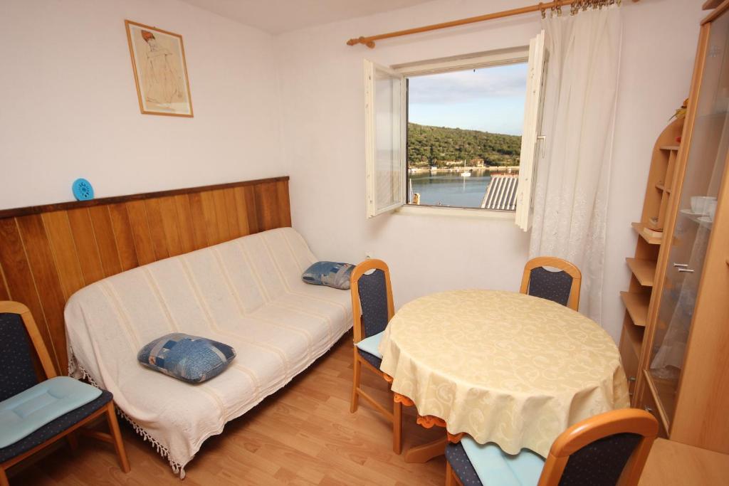 Postel nebo postele na pokoji v ubytování Apartments with WiFi Vis - 8435