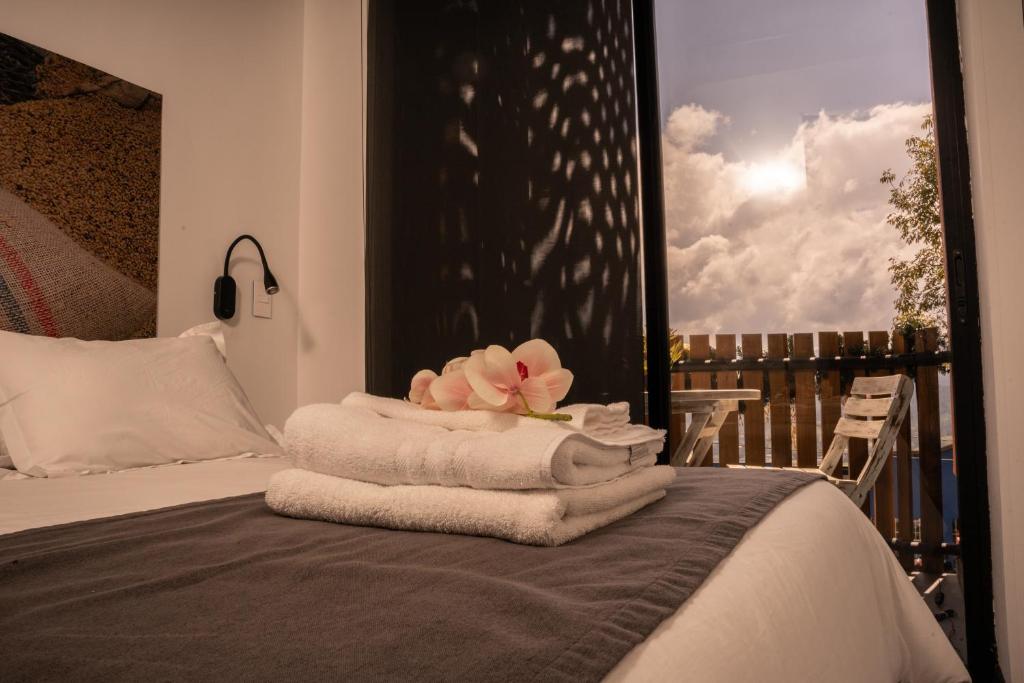 Postel nebo postele na pokoji v ubytování The Coffee Club Apartahotel