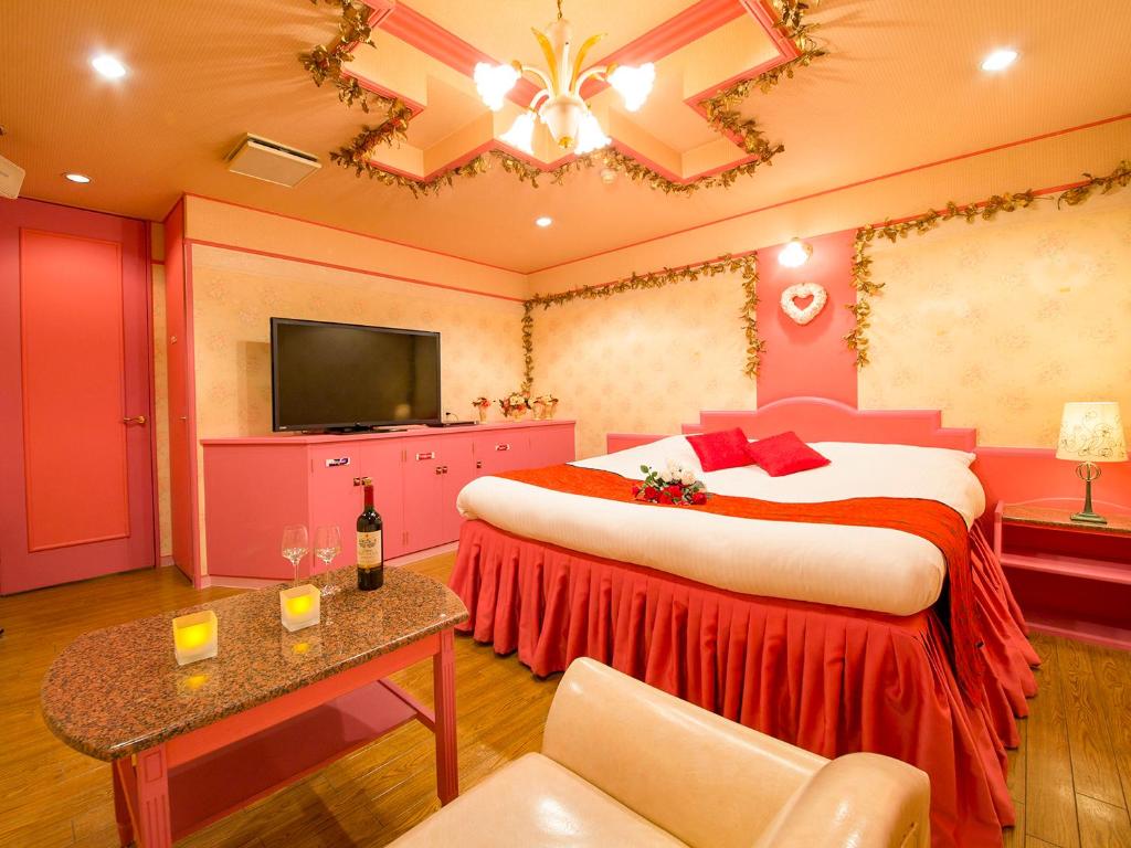 Postel nebo postele na pokoji v ubytování Hotel Gallery (Adult Only)