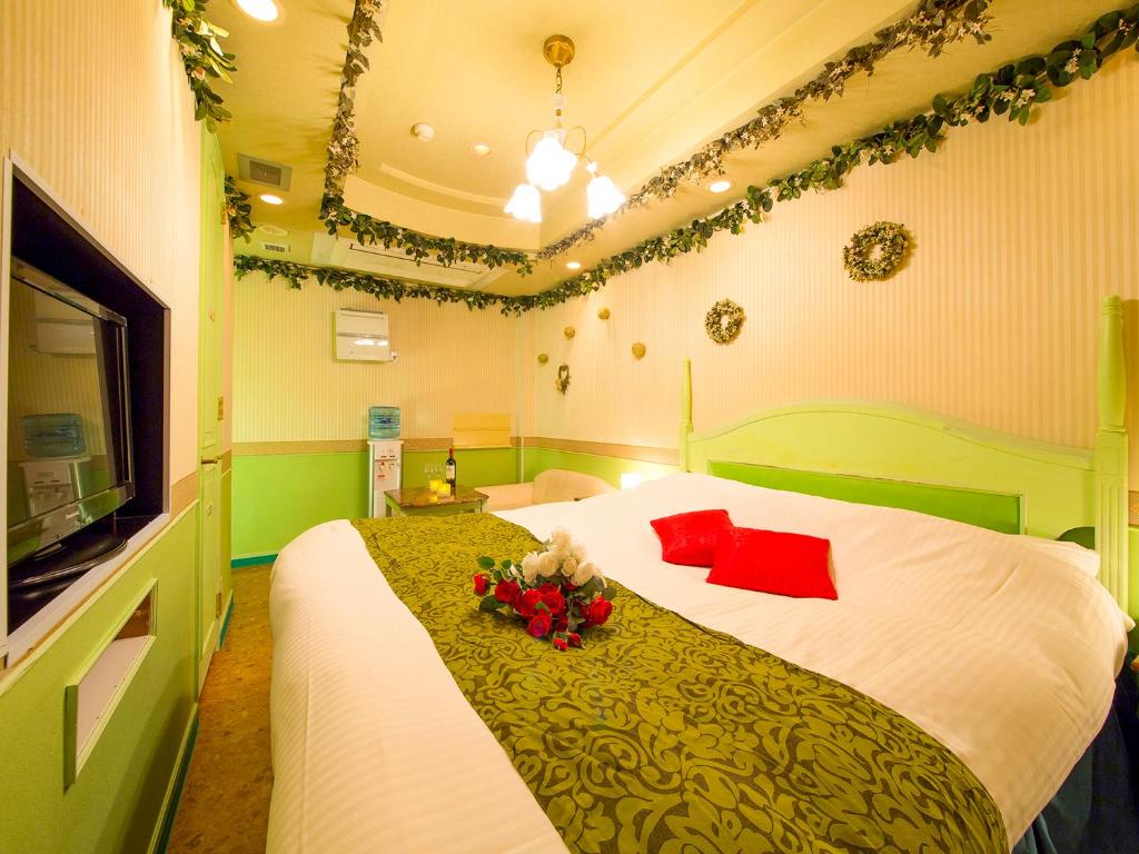 Postel nebo postele na pokoji v ubytování Hotel Gallery (Adult Only)