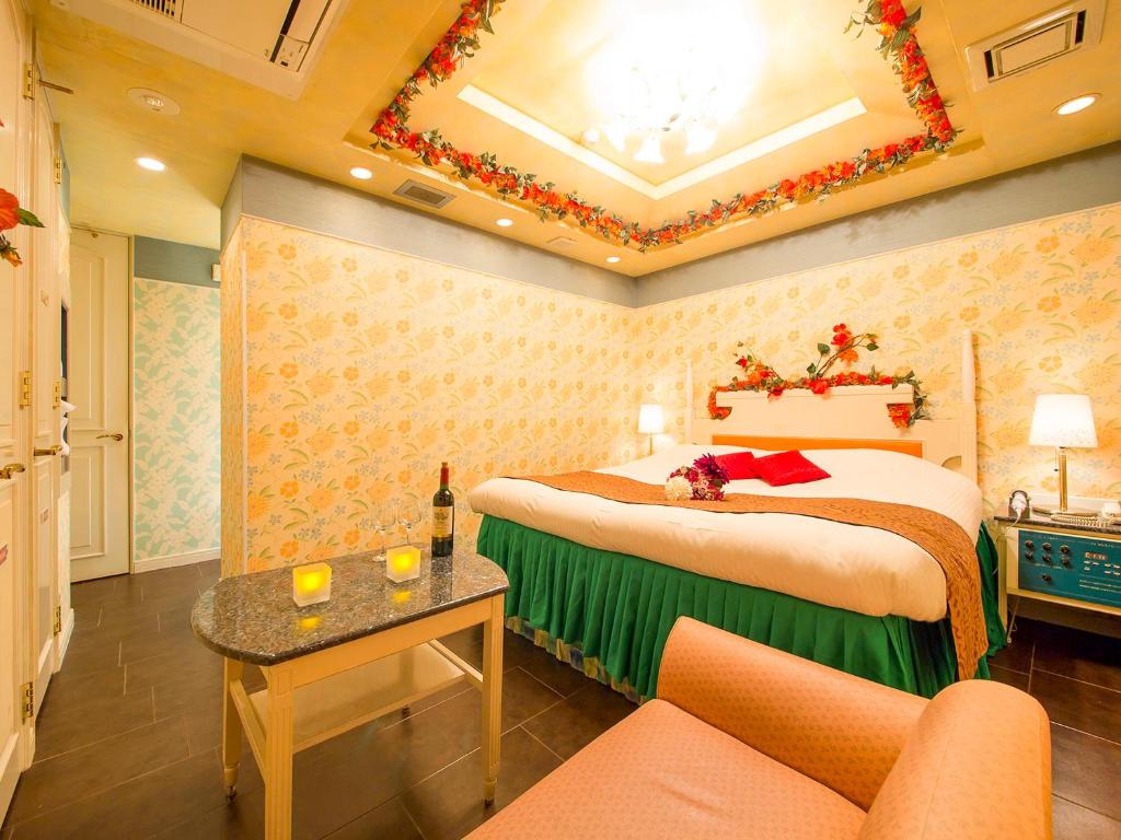 Postel nebo postele na pokoji v ubytování Hotel Gallery (Adult Only)