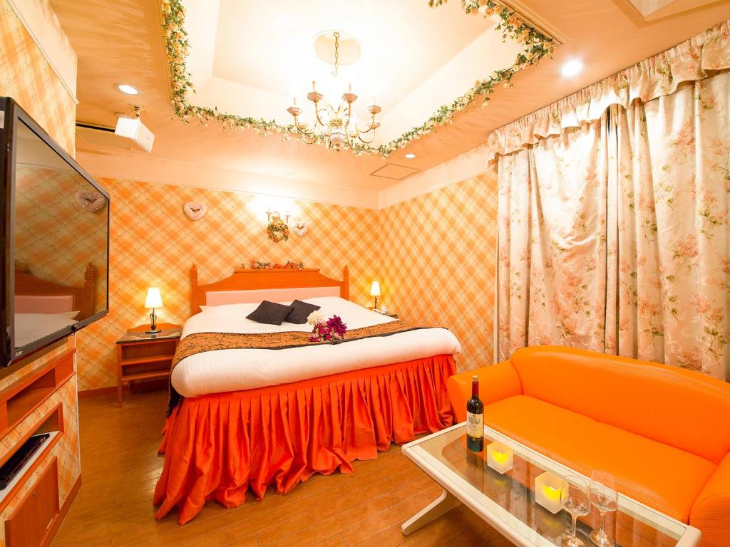 TV a/nebo společenská místnost v ubytování Hotel Gallery (Adult Only)
