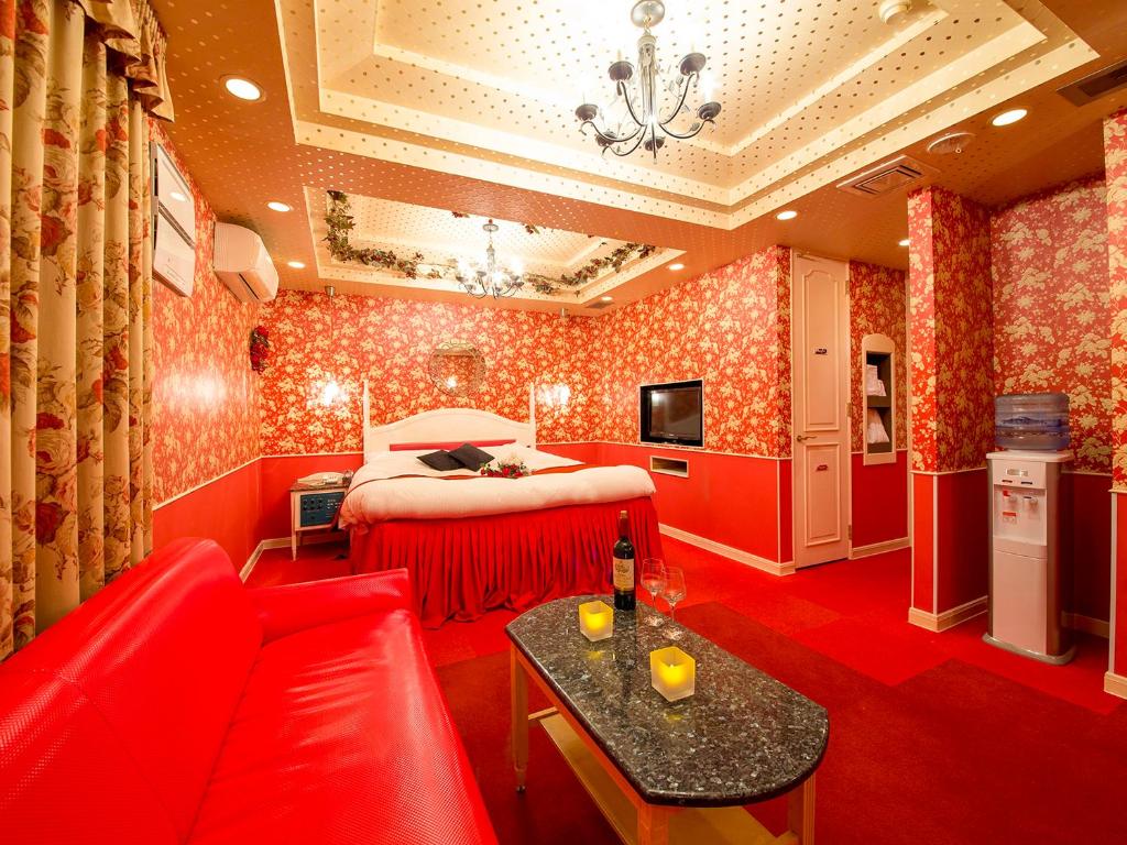 TV a/nebo společenská místnost v ubytování Hotel Gallery (Adult Only)