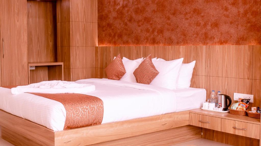 Postel nebo postele na pokoji v ubytování Hotel DC Star