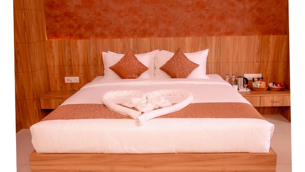 Postel nebo postele na pokoji v ubytování Hotel DC Star