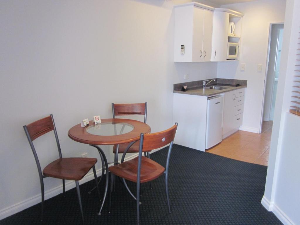 Kuchyň nebo kuchyňský kout v ubytování Beachfront Motel