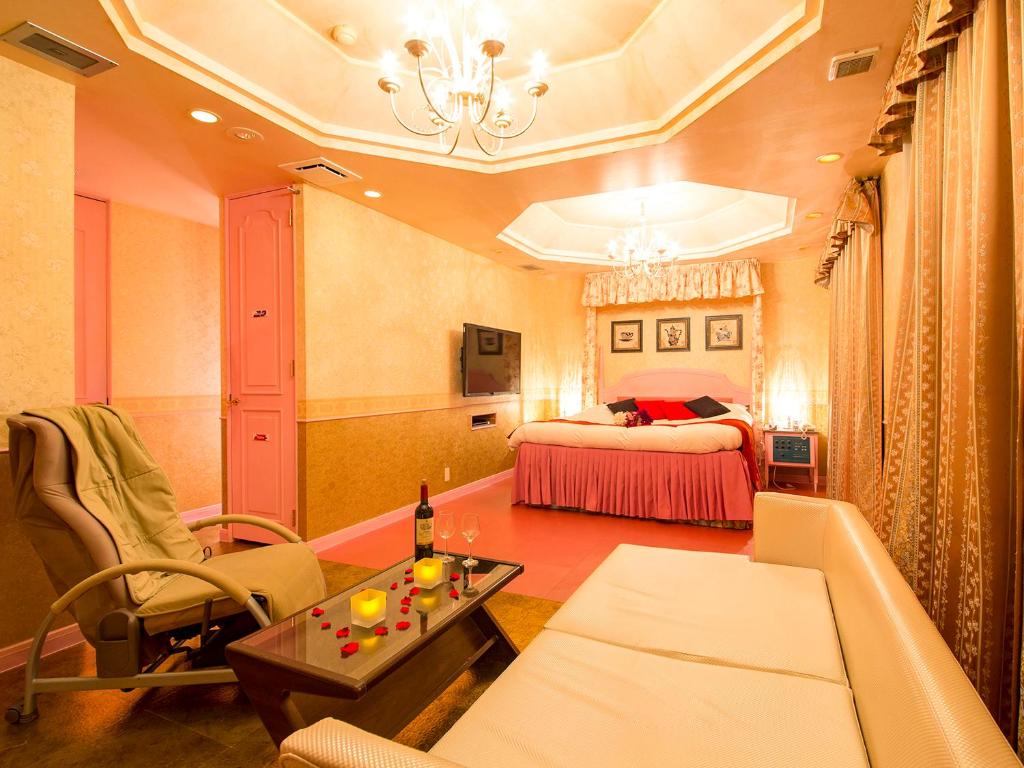Postel nebo postele na pokoji v ubytování Hotel Gallery (Adult Only)