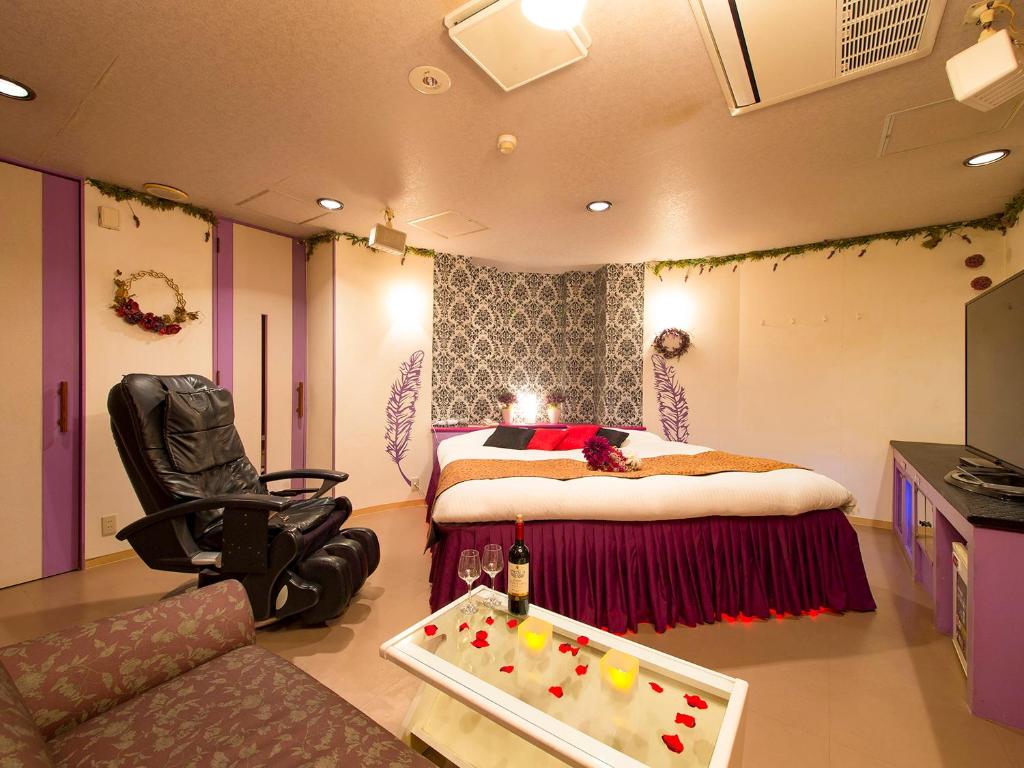 Postel nebo postele na pokoji v ubytování Hotel Gallery (Adult Only)