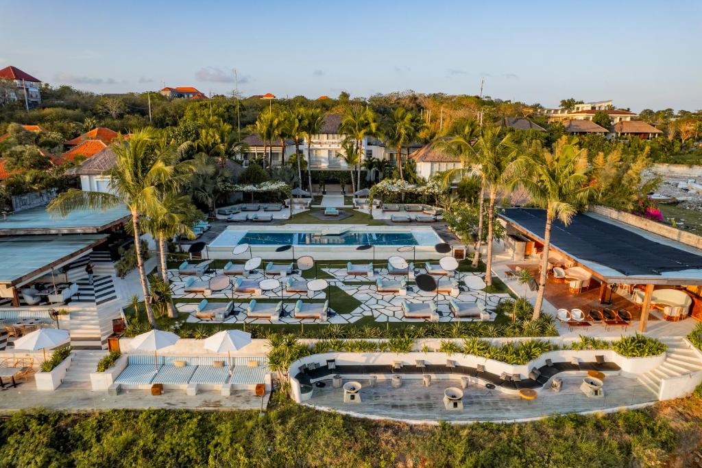 an aerial view of a resort with a pool at Ulu Cliffhouse in Uluwatu