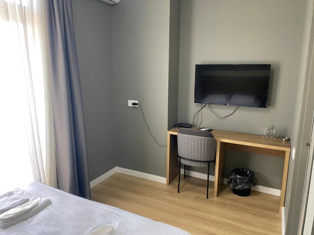 TV a/nebo společenská místnost v ubytování boulevard apartments