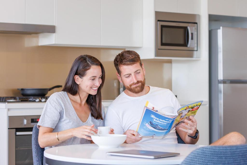 Kuchyň nebo kuchyňský kout v ubytování Meriton Suites Zetland