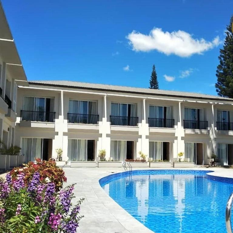 Bazén v ubytování The Balcone Suites & Resort nebo v jeho okolí