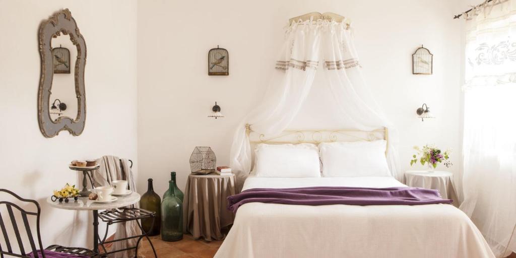 Postel nebo postele na pokoji v ubytování Masseria La Chiusa Delle More