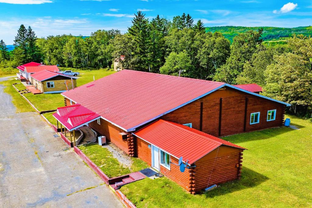 an overhead view of a house with red roof at Love Hotels St John River at Fort Kent ME in Saint John