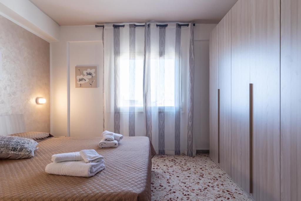 Posteľ alebo postele v izbe v ubytovaní Angy Apartment