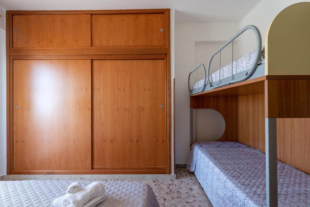 Posteľ alebo postele v izbe v ubytovaní Angy Apartment