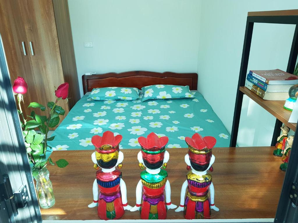 Ένα ή περισσότερα κρεβάτια σε δωμάτιο στο Water puppet nest - private and cozy space for you