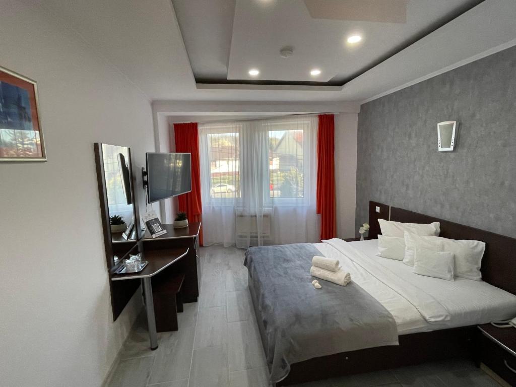 TV a/nebo společenská místnost v ubytování Silver Hotel
