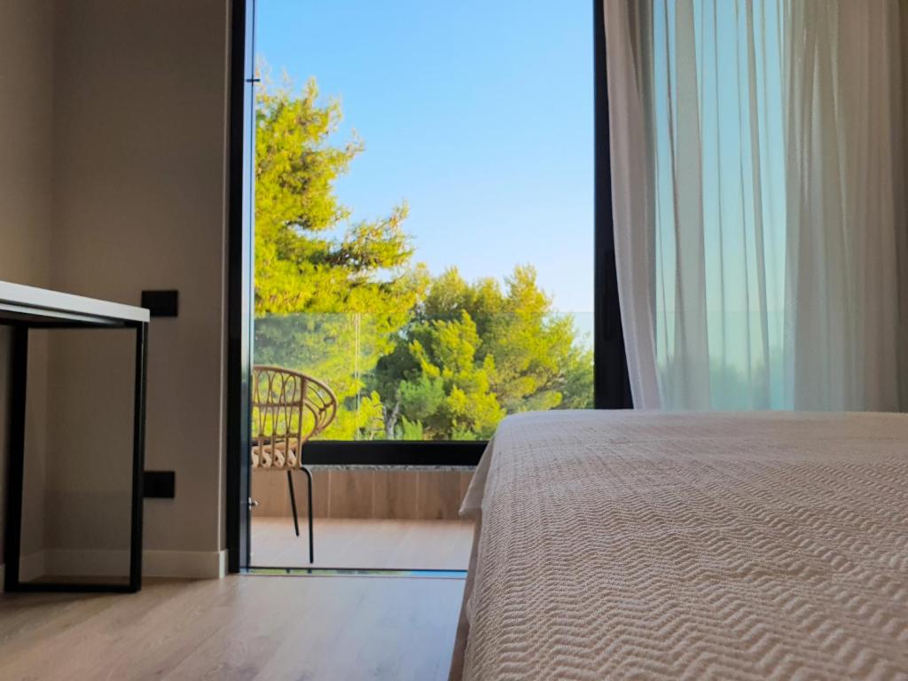 Postel nebo postele na pokoji v ubytování Meraviglia Boutique Hotel