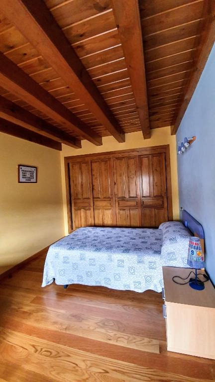 Postel nebo postele na pokoji v ubytování Casa Fraile aisa