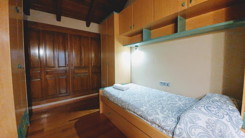 Postel nebo postele na pokoji v ubytování Casa Fraile aisa