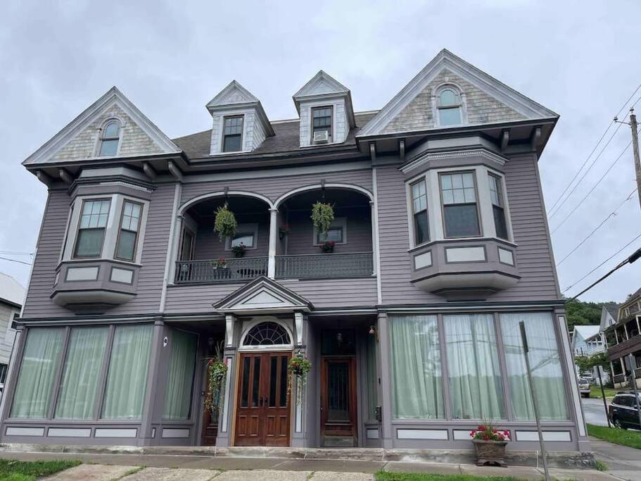 a gray house with a gambrel at Redefined Alchemy - The Studio in Little Falls