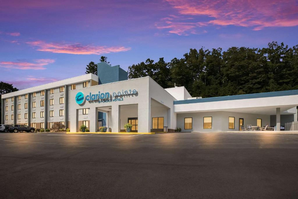 a rendering of the exterior of a hotel at Clarion Pointe Sylva near Cherokee Area in Dillsboro
