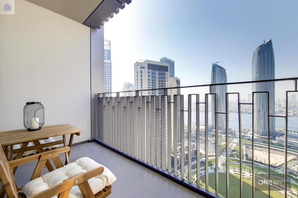 a balcony with a view of a city skyline at High Floor - Stunning Location - Canal View in Dubai