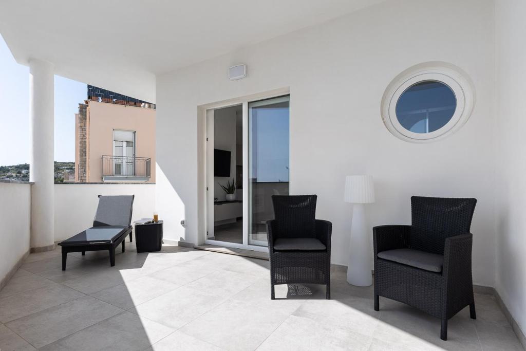 Posedenie v ubytovaní Oneweek Gaeta Suites and Apartments