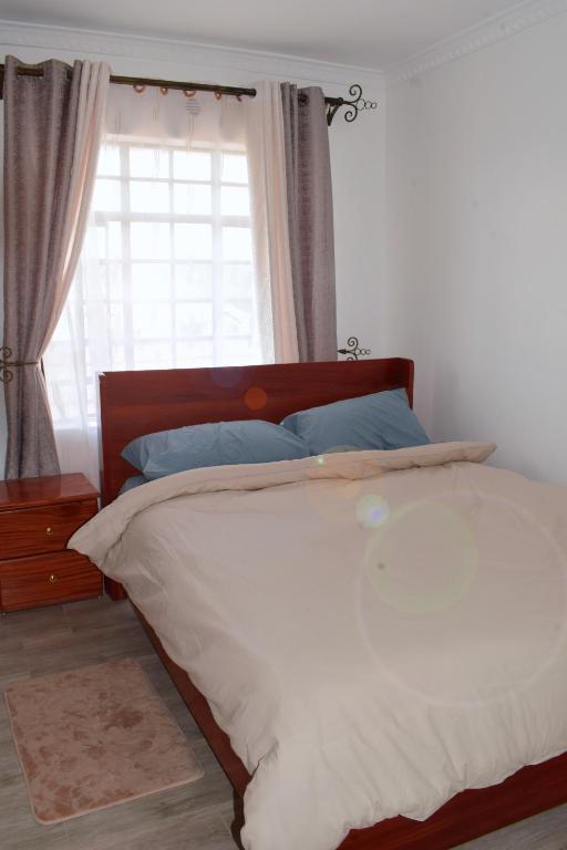 Postel nebo postele na pokoji v ubytování Cheerful 4-bedroom with pool