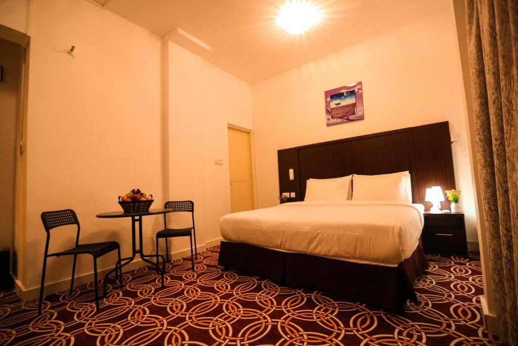 Postel nebo postele na pokoji v ubytování AL KARNAK HOTEL - BRANCH