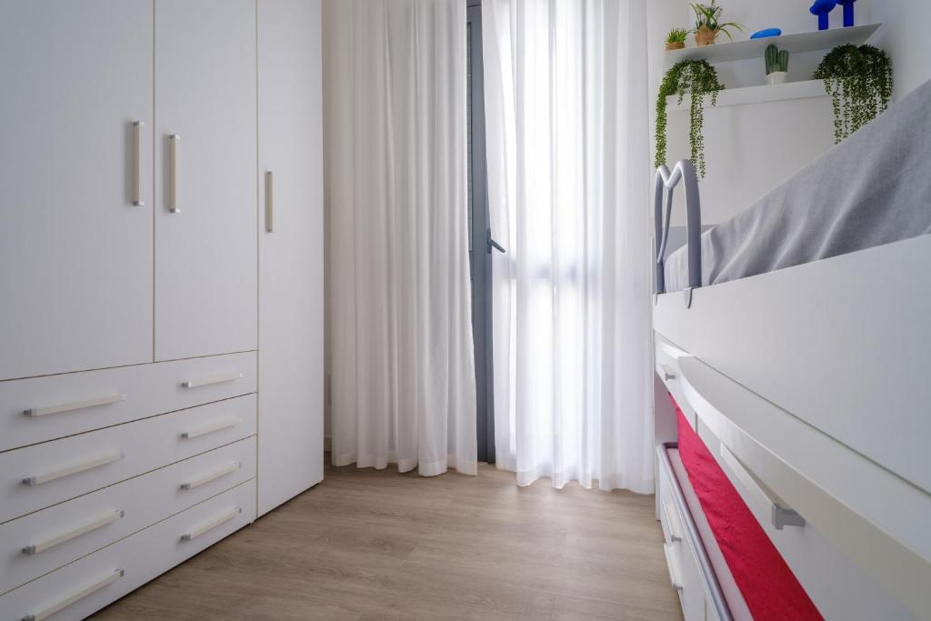 A bed or beds in a room at Appartamento Fico D'india