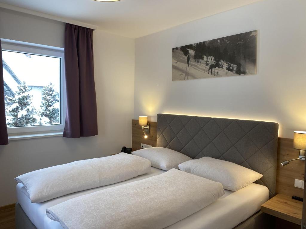 Postel nebo postele na pokoji v ubytování Appartementhaus Madlen
