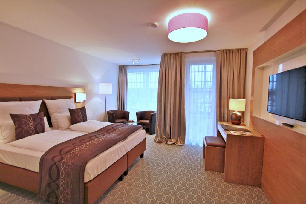 TV a/nebo společenská místnost v ubytování Hotel Landgasthof Gemmer