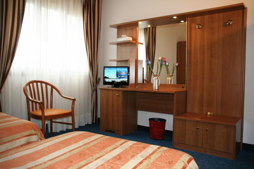 TV a/nebo společenská místnost v ubytování Hotel Kristall