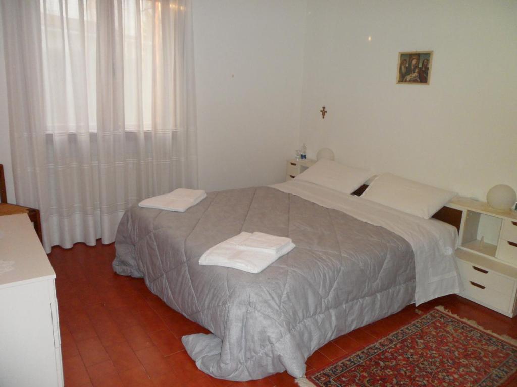 Postel nebo postele na pokoji v ubytování B&B Cuei di Baret