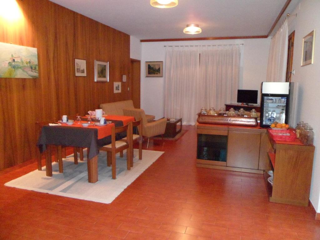 TV a/nebo společenská místnost v ubytování B&B Cuei di Baret
