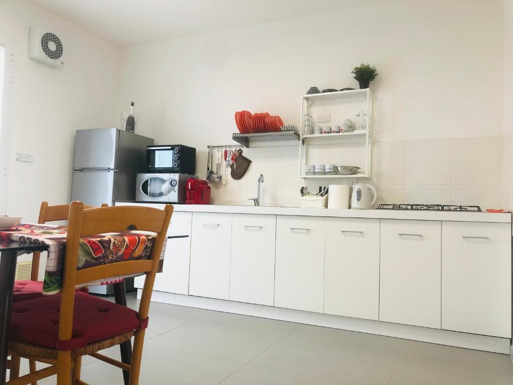 Kuchyň nebo kuchyňský kout v ubytování Casa Rogos