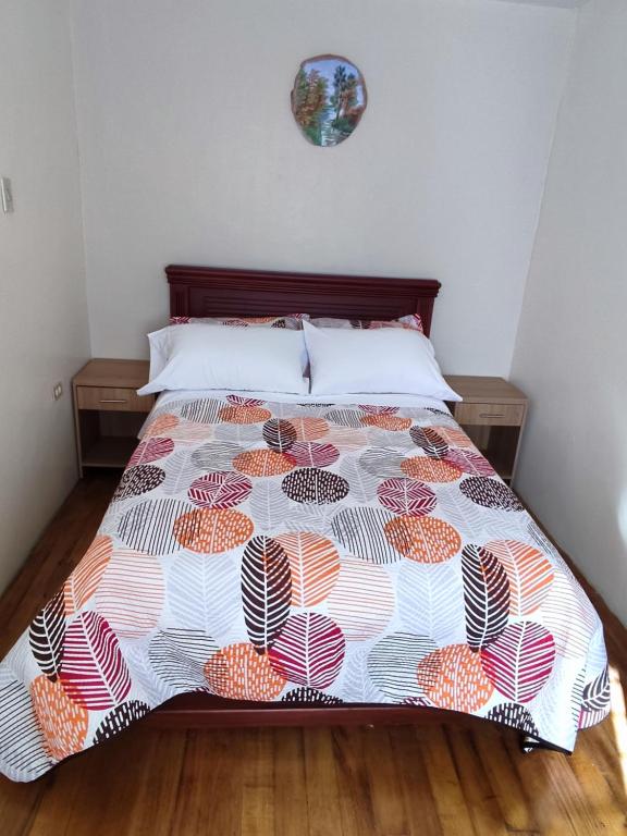 Postel nebo postele na pokoji v ubytování Dulce Hogar 02