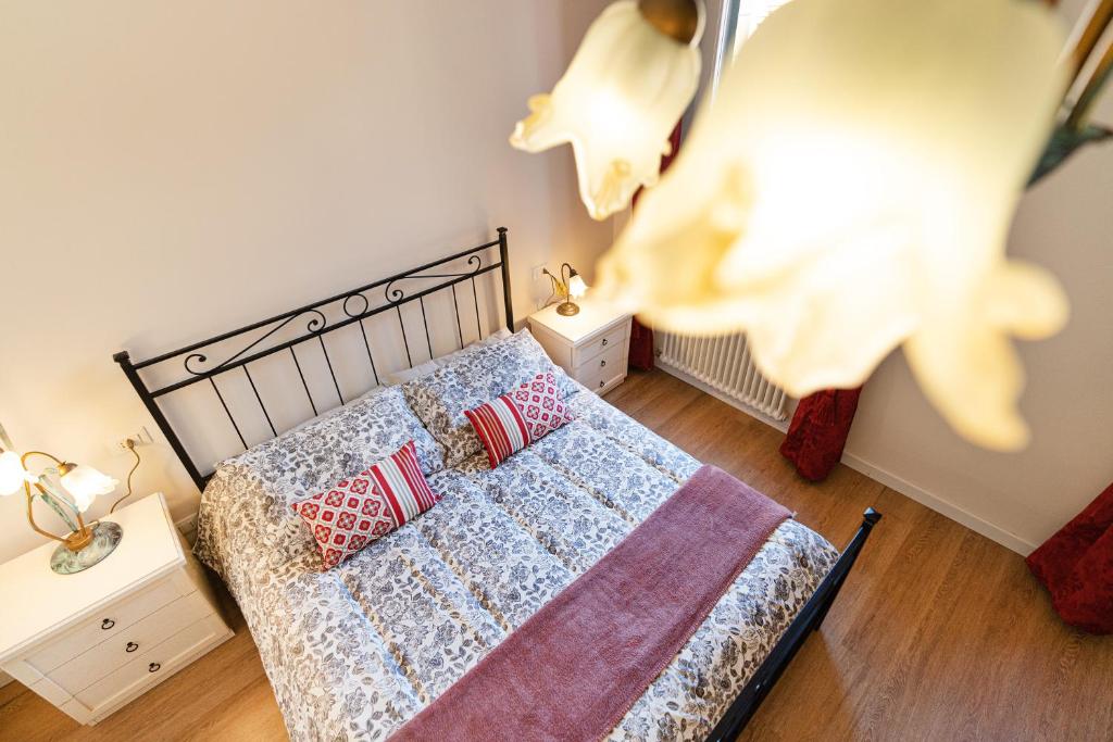 Posteľ alebo postele v izbe v ubytovaní Ricco di comfort, grande, luminoso e comodo