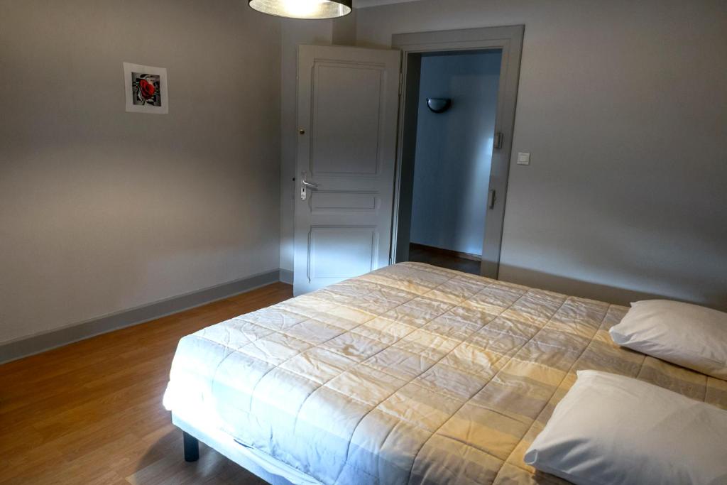 Postel nebo postele na pokoji v ubytování Gîte à La Montagne